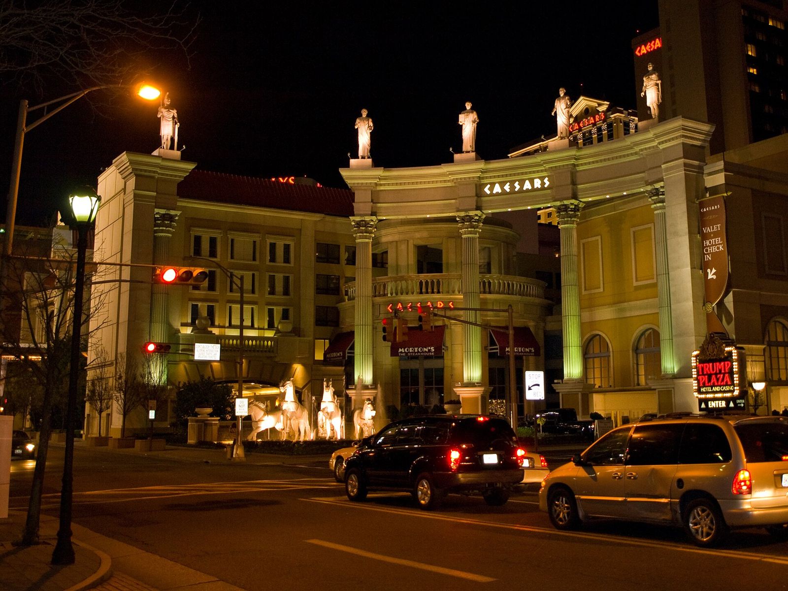 Caesars Atlantic City entrance lit up at night